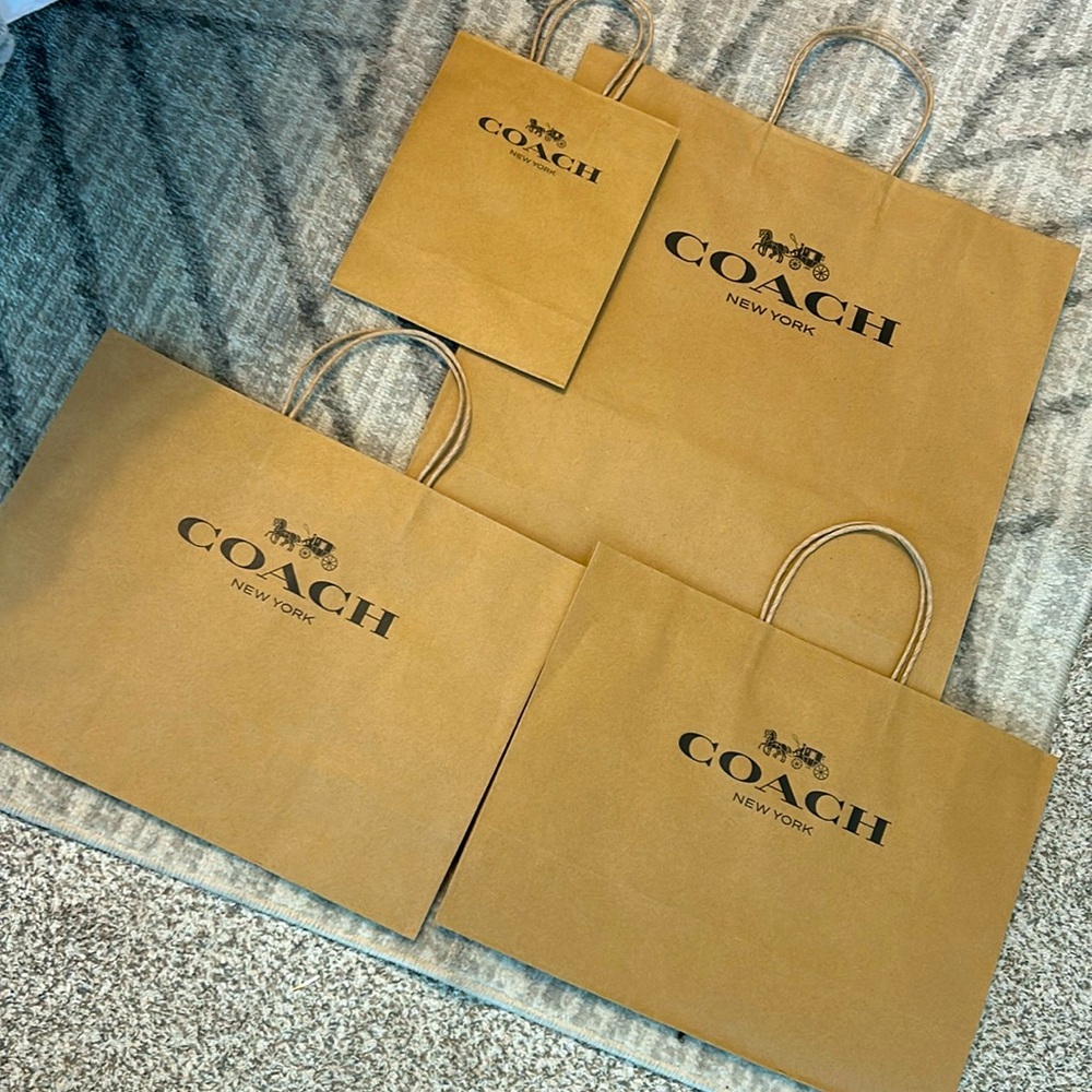 Assorted size paper Coach bags. Buy them as a package or pick your size.